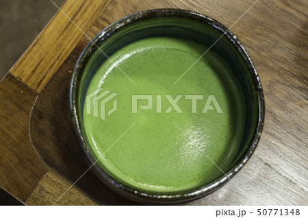 Bowl of hot matcha green tea drink 50771348