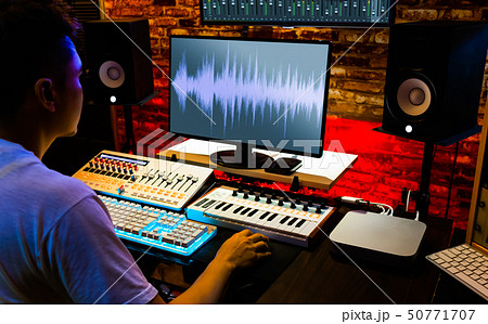 producer recording, editing music in home studio producer recording, editing music in home studio 50771707