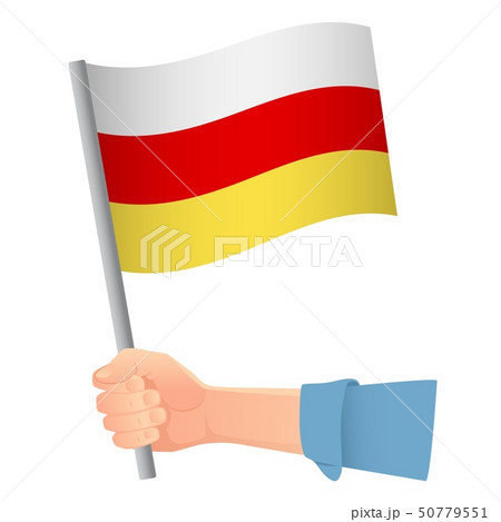 south ossetia flag in hand south ossetia flag in hand 50779551