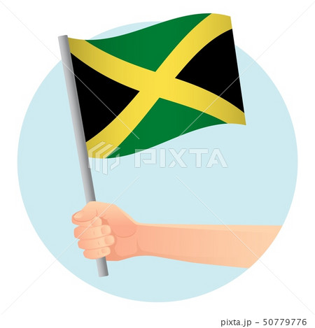 Jamaica flag in hand Jamaica flag in hand 50779776