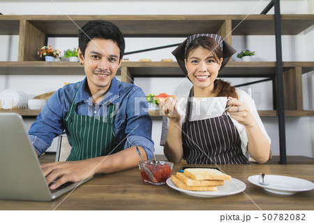 Asian couple at kitchen room Asian couple at kitchen room 50782082