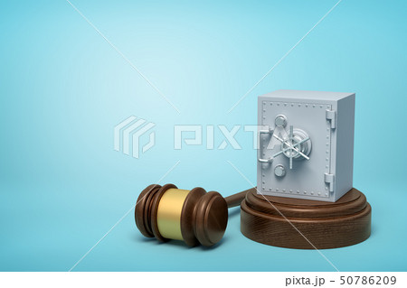 3d rendering of metal bank safe on round wooden block and brown wooden gavel on blue background 3d rendering of metal bank safe on round wooden block and brown wooden gavel on blue background 50786209