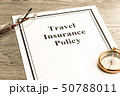 Travel Insurance Policy on Table. Business Concept 50788011