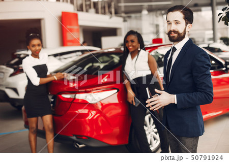 Two stylish black woman in a car salon Two stylish black woman in a car salon 50791924