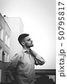 Beautiful young man outside portfolio 50795817