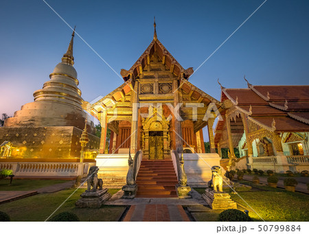 Wat Phra Singh Temple at night in Chiang Mai. 50799884