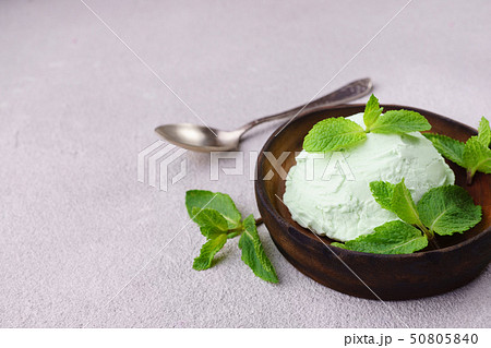 Mint ice cream scoop on stone table, copy space Mint ice cream scoop on stone table, copy space 50805840