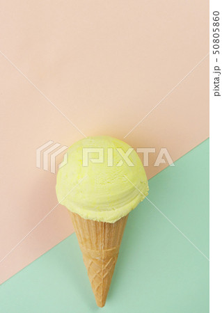Ice-cream scoop waffle cone on bright background Ice-cream scoop waffle cone on bright background 50805860