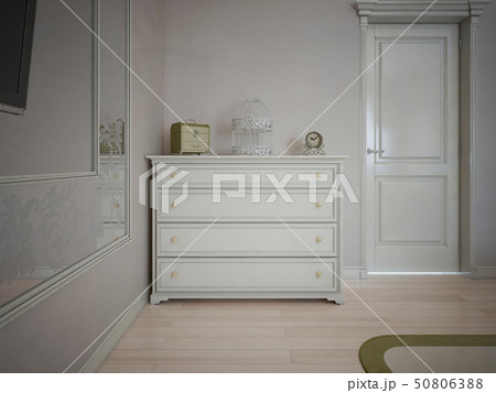 White dresser in bedroom with cream walls 50806388