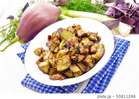 Eggplant fried on blue napkin 50811268