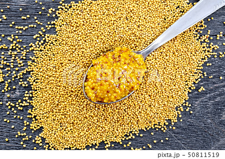 Sauce mustard Dijon in spoon on board top Sauce mustard Dijon in spoon on board top 50811519