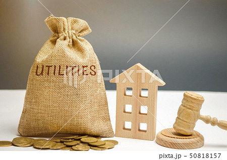 A money bag with the word Utilities, a house  50818157