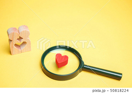 Heart, magnifying glass and a couple in love. Heart, magnifying glass and a couple in love. 50818224