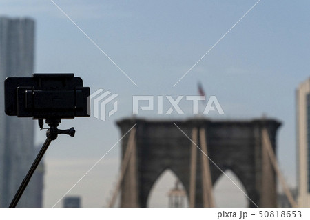 Selfie with smartphone and tripod on Brooklyn Selfie with smartphone and tripod on Brooklyn 50818653