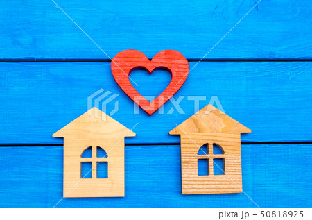 wooden houses and heart on a blue background wooden houses and heart on a blue background 50818925