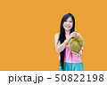 Isolated women hold big durian, smiling Thai women 50822198