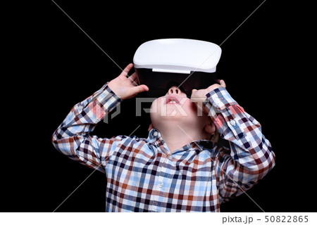 Little blond boy with glasses of virtual reality 50822865