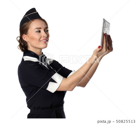 Air hostess in blue uniform with tablet computer 50825513