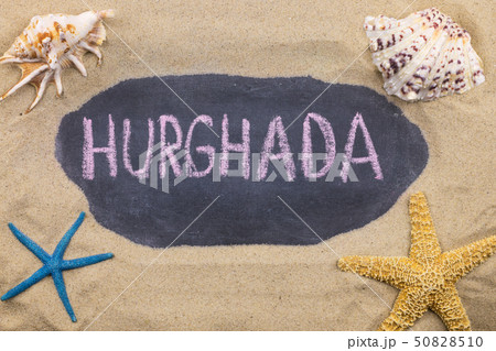 Handwritten word HURGHADA written in chalk, among 50828510