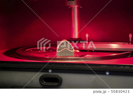 Object printed from metal powder on metal 3d printer, working chamber. 50830423