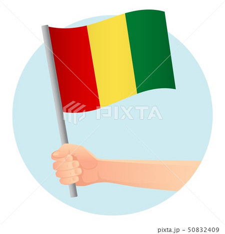 Guinea flag in hand 50832409