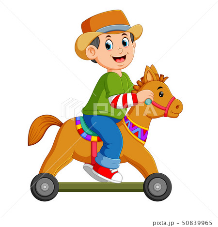 the boy is playing on the horse toy with the wheel 50839965