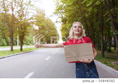 Travelling and hitchhiking concept. 50848382