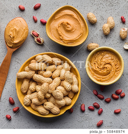 Bowls with peanut butter and peanuts Bowls with peanut butter and peanuts 50848974