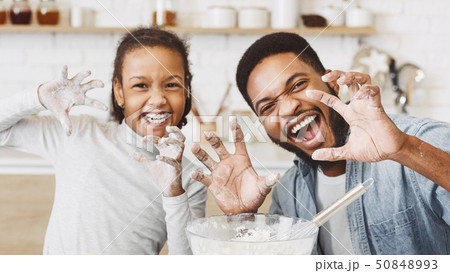 Funny cooking together concept 50848993