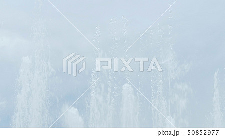 Streams of water from fountain 50852977