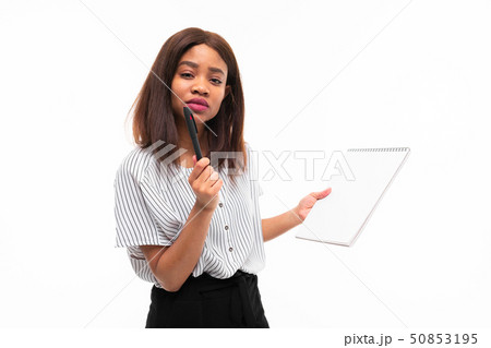 charming dark-skinned young girl explain smth on the plane table isolated on background 50853195