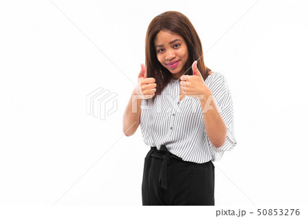 portrait of african young girl possing and gesticulates hands on background portrait of african young girl possing and gesticulates hands on background 50853276