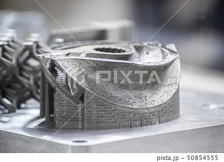 Man is holding object printed on metal 3d printer 50854555