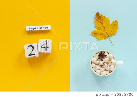 Autumn composition. Wooden calendar September 24, 50855700