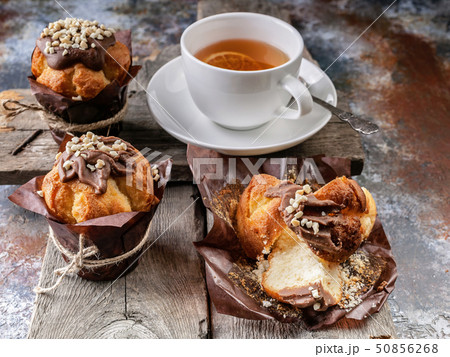 Homemade muffins and flavored tea Homemade muffins and flavored tea 50856268