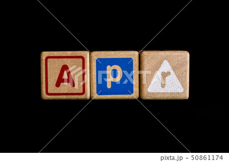 April on wood Cubic on black background  ,Month 50861174