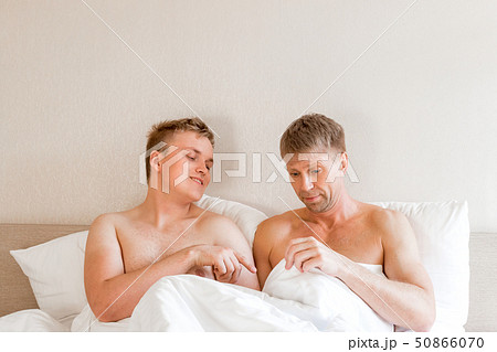 Handsome Gay Men Couple On Bed Together Love Andの写真素材