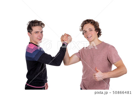 Portrait of a two cheerful young men celebrating Portrait of a two cheerful young men celebrating 50866481