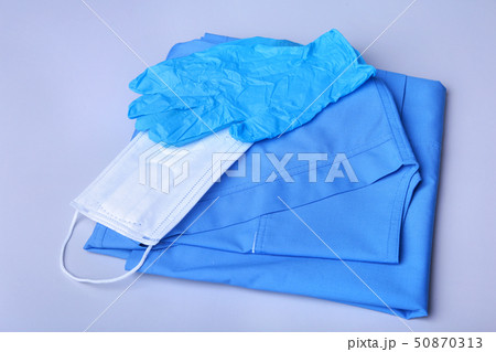 Medical stethoscope lying on a blue doctor's form and notepad close-up. the therapist's work space. 50870313