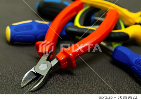 pile of tools of hand red nippers on the pile of tools of hand red nippers on the 50889822