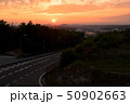 日の入りと道路 50902663