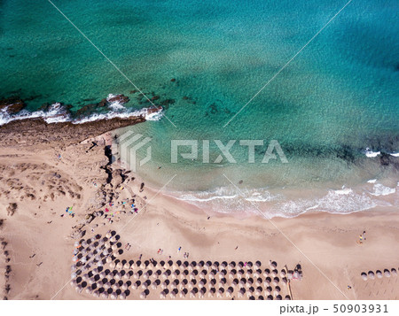 Wide sandy coastline, long sea waves of Falasarna beach Crete, Greece 50903931