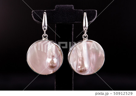 Round flat earrings are executed from Round flat earrings are executed from 50912529