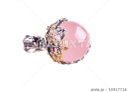 A ring a sphere from rose quartz in a silver frame 50917716