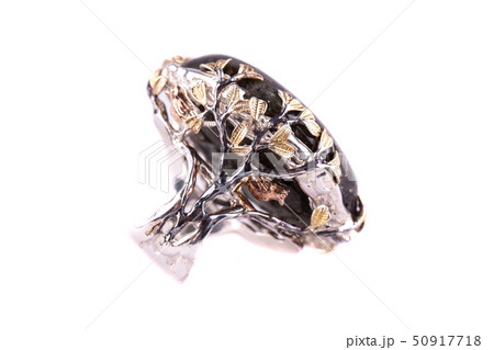 The frame of a ring is made of sterling silver and 50917718