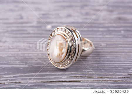 A ring with nacre in silver. The massive ring  50920429