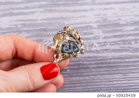 Semiprecious stones in a ring from silver with top 50920439