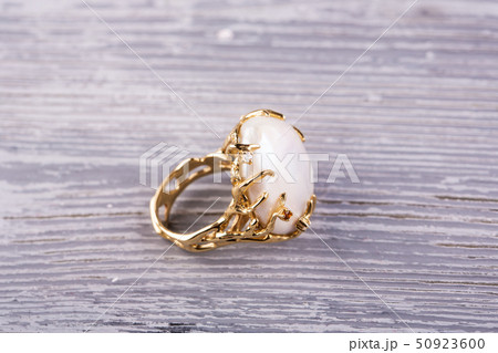 The ring in a gold frame is executed with big skil 50923600