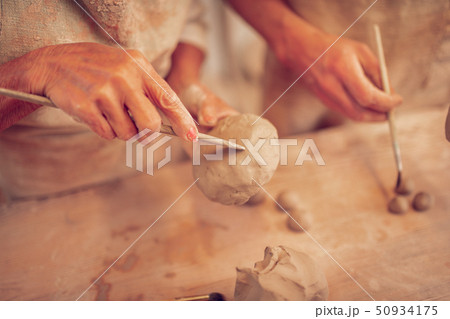 Close up of a carving knife being in use Close up of a carving knife being in use 50934175