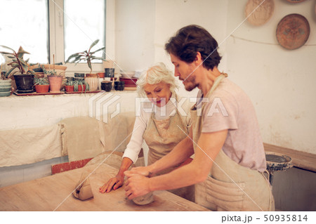 Nice pleasant man and woman working together 50935814